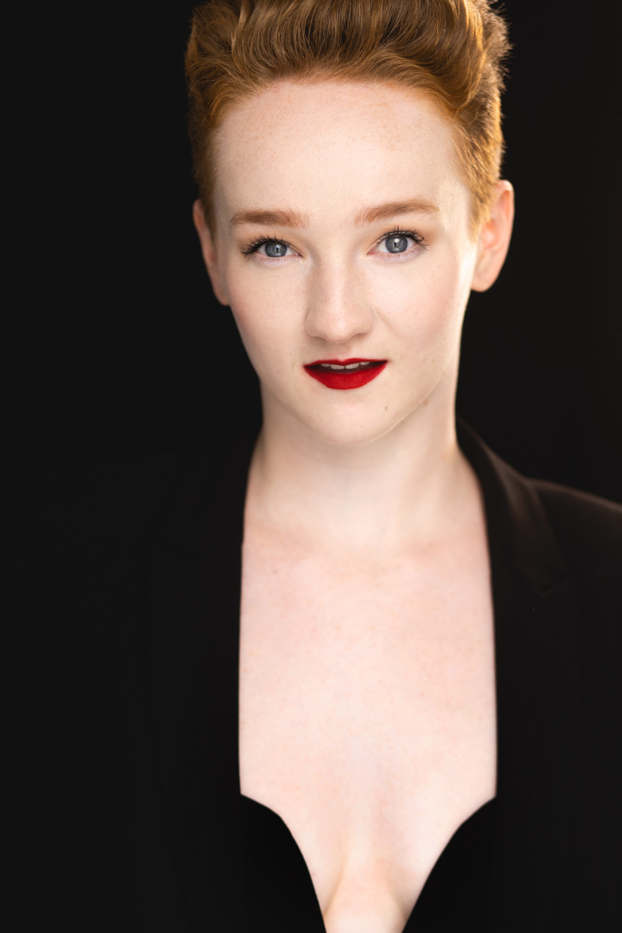 Professional headshot of Ellie